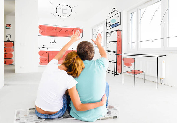 Pareja en su nuevo apartamento vacío — Foto de Stock