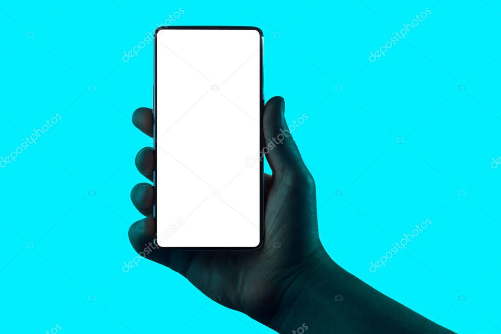 Hand holding phone.