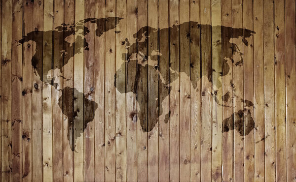 world map on old wooden wall