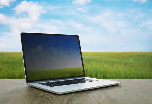 Pc on table, fields — Stock Photo, Image