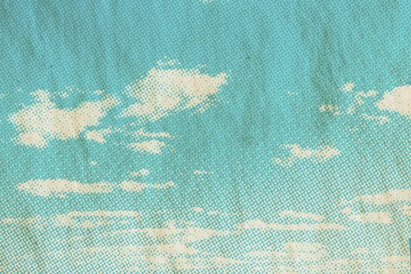 retro sky pattern on old paper texture. vintage clouds.