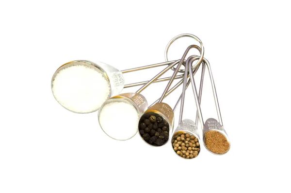 Set of measuring spoons with spices — Stock Photo, Image