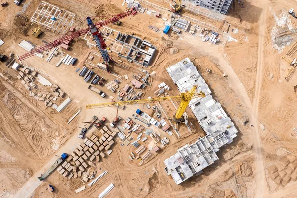 industrial machinery working at construction site. drone image.