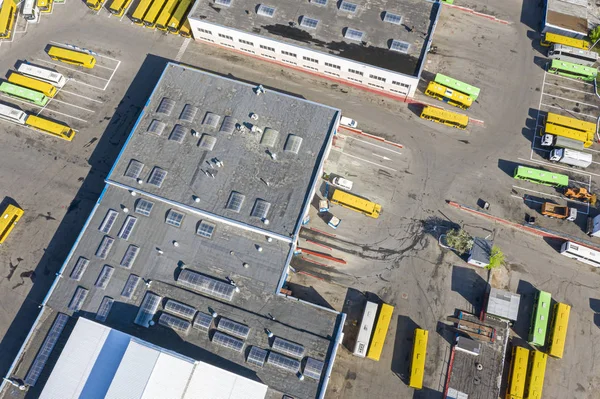 parked buses at bus depot. top view