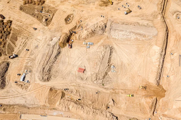 aerial view of industrial machinery constructing new road
