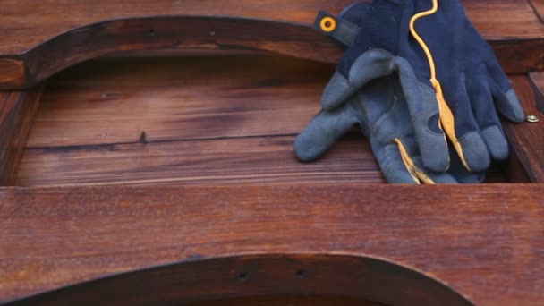 Still Life Carpentry Wooden Table Gloves Screwdriver — Stock Video