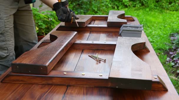 Man Carpenter Making Table Tightening Screws Screwdriver — Stock Video