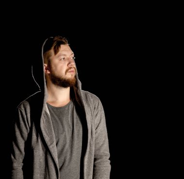 siyah bir zemin üzerine bir sakallı bir adam görüntüsü