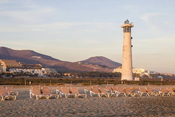 Matorral Beach och Lighthouse i Morro Jable, Fuerteventura, Spa Stockbild