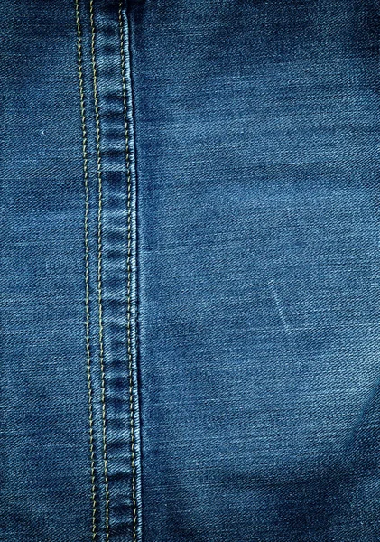 缝合带纹理的蓝色牛仔裤牛仔面料背景 — 图库照片