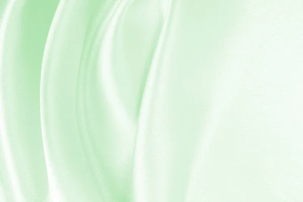 滑らかなエレガントな緑のシルクやサテンの高級布のテクスチャは 抽象的な背景として使用することができます 豪華な背景デザイン — ストック写真