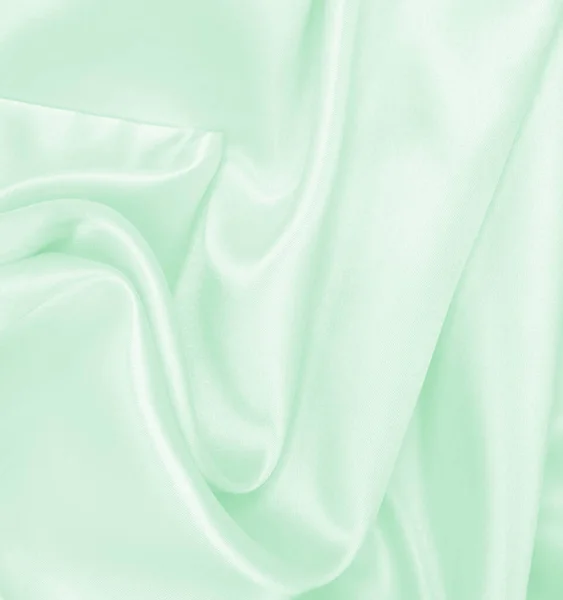 滑らかなエレガントな緑のシルクやサテンの高級布のテクスチャは 抽象的な背景として使用することができます 豪華な背景デザイン — ストック写真