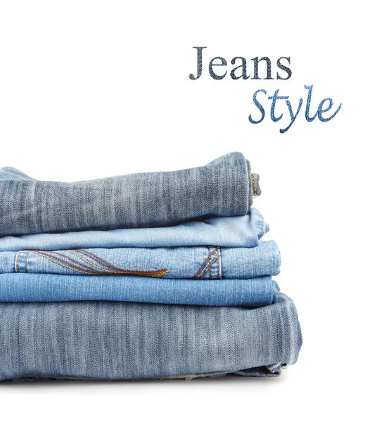 Pilha Calças Jeans Azuis Isoladas Fundo Branco — Fotografia de Stock