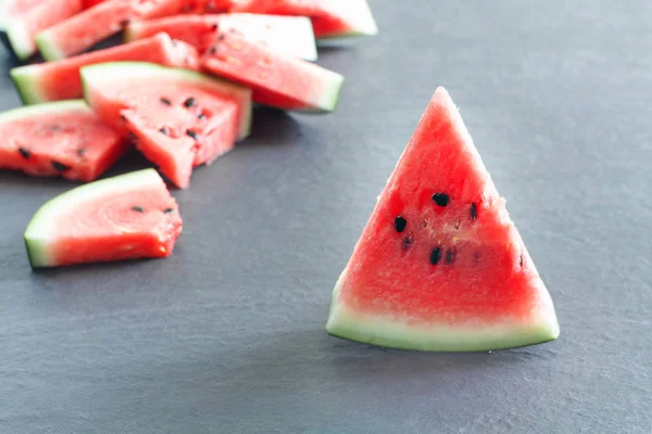 Pieces Juicy Ripe Watermelon Slices Gray Stone Countertop — Stock Photo, Image