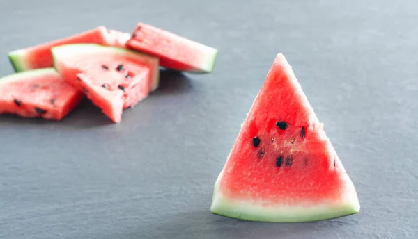 Pieces Juicy Ripe Watermelon Slices Gray Stone Countertop — Stock Photo, Image