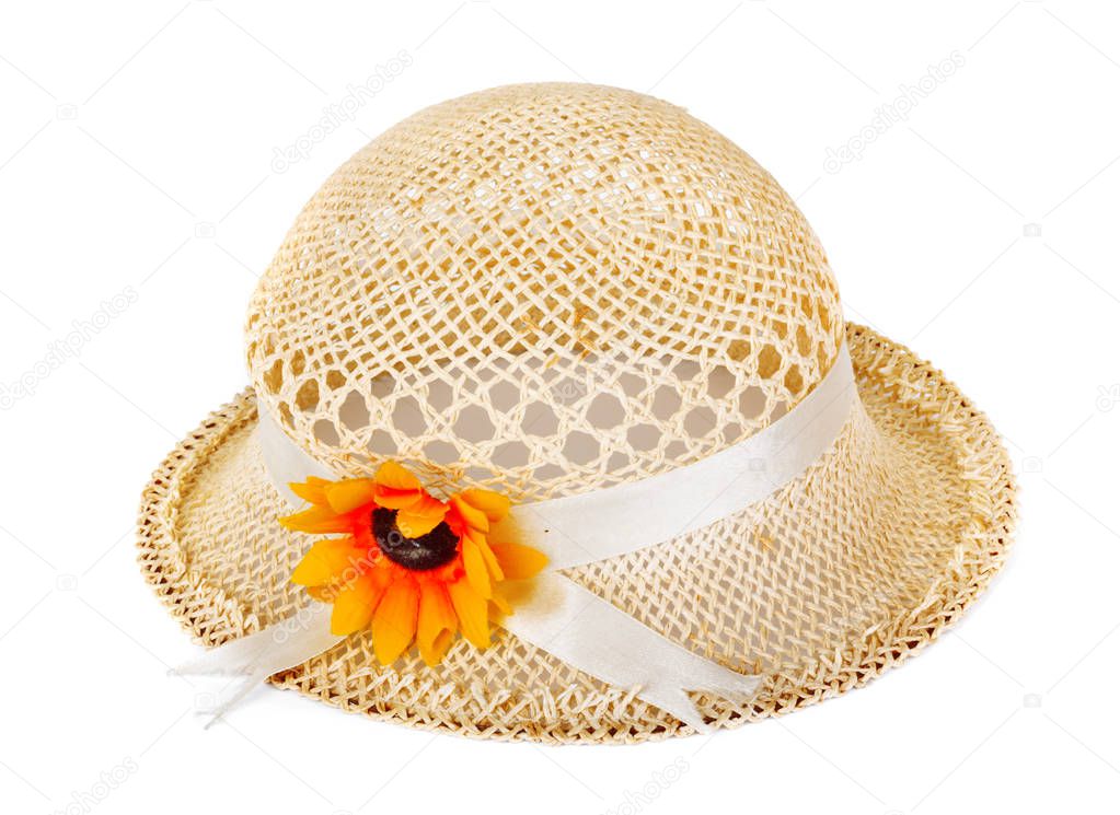 Pretty straw hat with flower on white isolated background