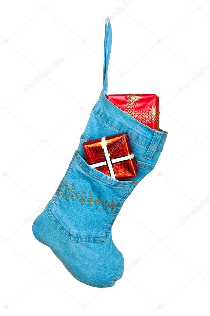 Blue denim christmas boot with gifts on white isolated background