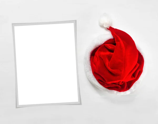 Leuchtend Roter Weihnachtsmann Hut Mit Papierrahmen Für Text Oder Fotos — Stockfoto