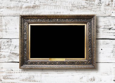 Eski vintage altın süslü çerçeve için grunge ahşap duvar resmi