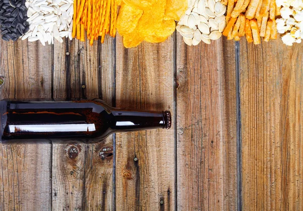 Chips Crackers Seeds Nuts Bottle Fresh Cold Beer Wooden Table — Stock Photo, Image