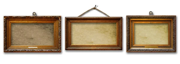 Set of three vintage golden baroque wooden frames on white isolated background