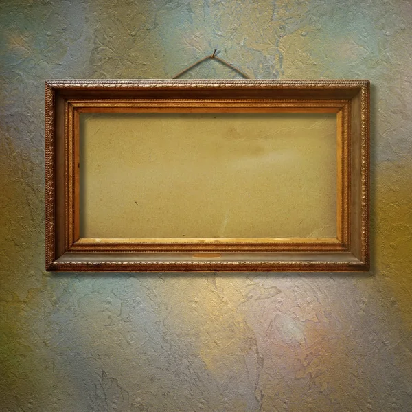 グランジの石壁に絵の古いヴィンテージ ゴールド華やかなフレーム — ストック写真