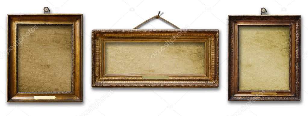 Set of three vintage golden baroque wooden frames on white isolated background