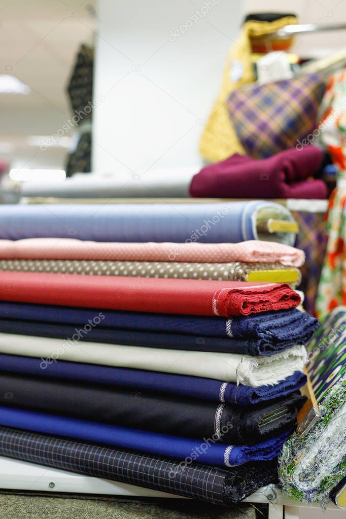 Various multicolored textiles for sale in  shop