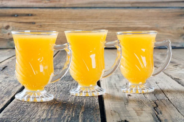 Healthy pumpkin fruit smoothie on  wooden table — Stock Photo, Image