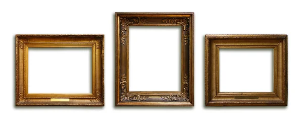 Set of three vintage golden baroque wooden frames on isolated background — Stock Photo, Image