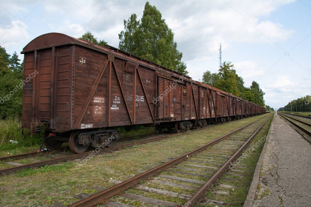 Railroad scene with cargo train.