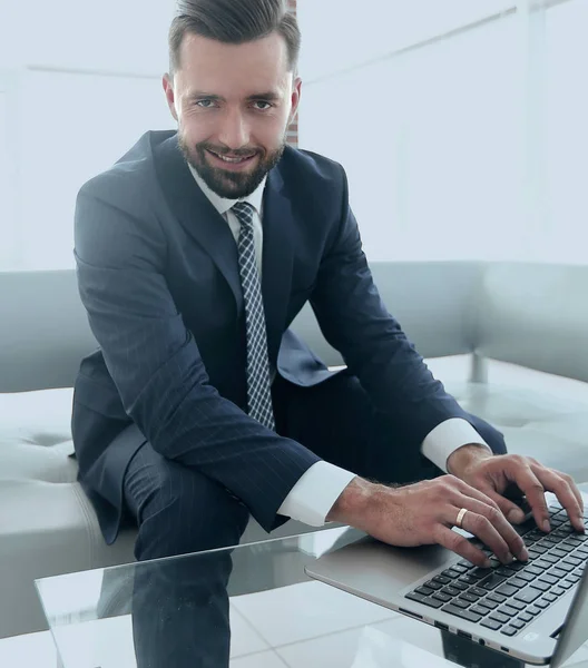 Employee of the company typing text on the laptop keyboard — Stock Photo, Image