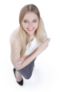 Yukarıdan görüntüleyin. Kameraya bakarak başarılı genç iş kadını.