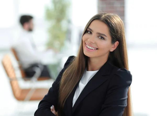 Young business woman on the background of the office — Stock Photo, Image
