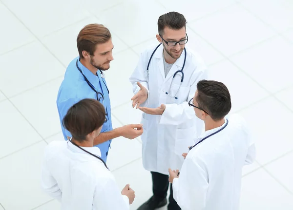 Smiling group of doctors discussing — Stock Photo, Image