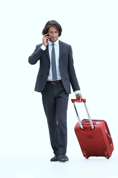 Successful businessman with Luggage talking on the phone. — Stock Photo, Image