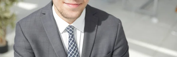 Closeup.the face of a successful young man — Stock Photo, Image