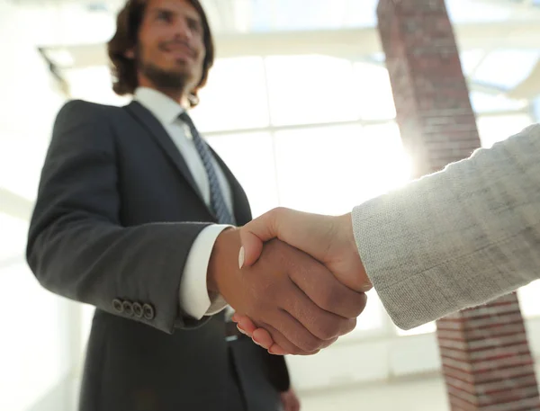 Excited smiling businessman handshaking partner at meeting, — Stock Photo, Image