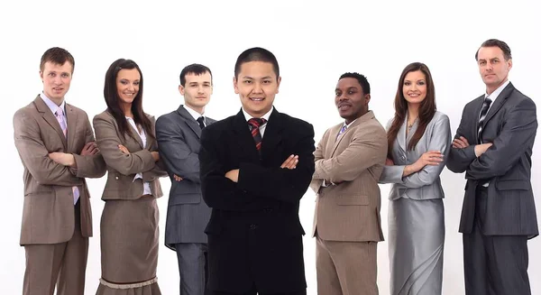 Hombre de negocios parado frente a su equipo de negocios — Foto de Stock