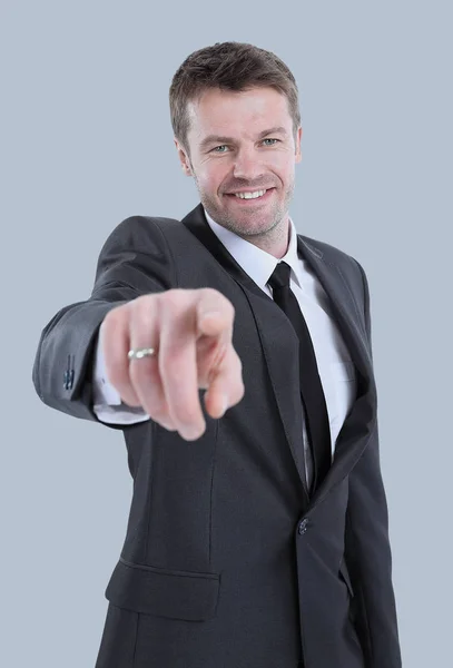 Retrato de un joven señalándote con el dedo — Foto de Stock