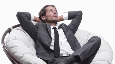 rahat bir sandalyede oturan işadamı