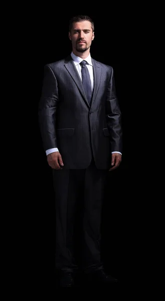 Close-up van portret van een zakenman op zwarte achtergrond — Stockfoto