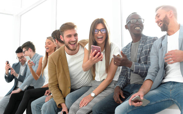 group of young people discussing new information