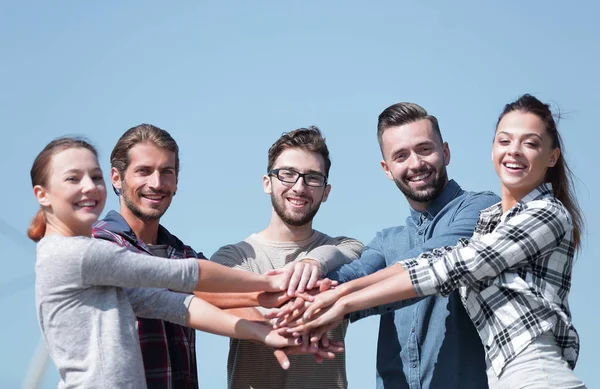 Team of young people shows their unity. — Stock Photo, Image