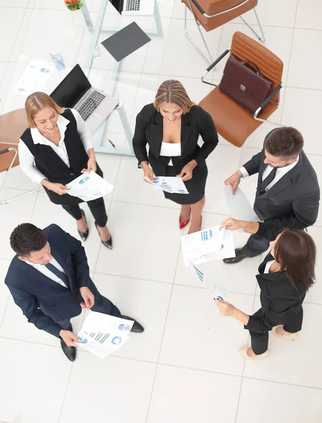 View from the top.business team throwing work documents.t — Stock Photo, Image