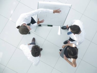 En baştan görüntüleyin. arka plan resmi bir iş takımının yeni fikirler tartışıyor