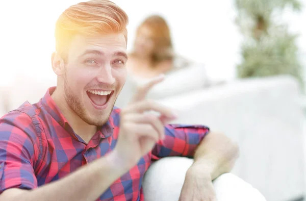 Closeup of happy young man showing forward, — Stock Photo, Image