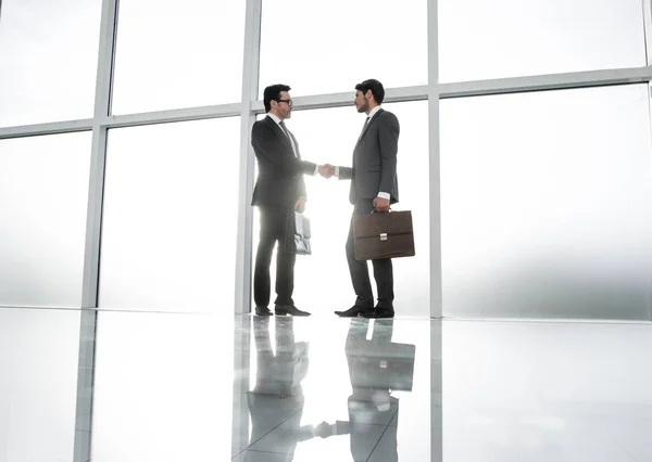 Zakelijke background.handshake mensen uit het bedrijfsleven — Stockfoto