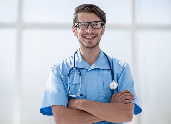 Cirujano confiado hombre en uniforme azul —  Fotos de Stock