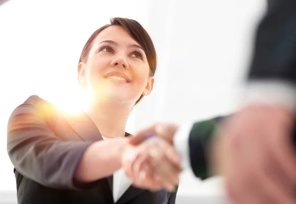 Closeup of business woman shaking hands with her business partner. — Stock Photo, Image